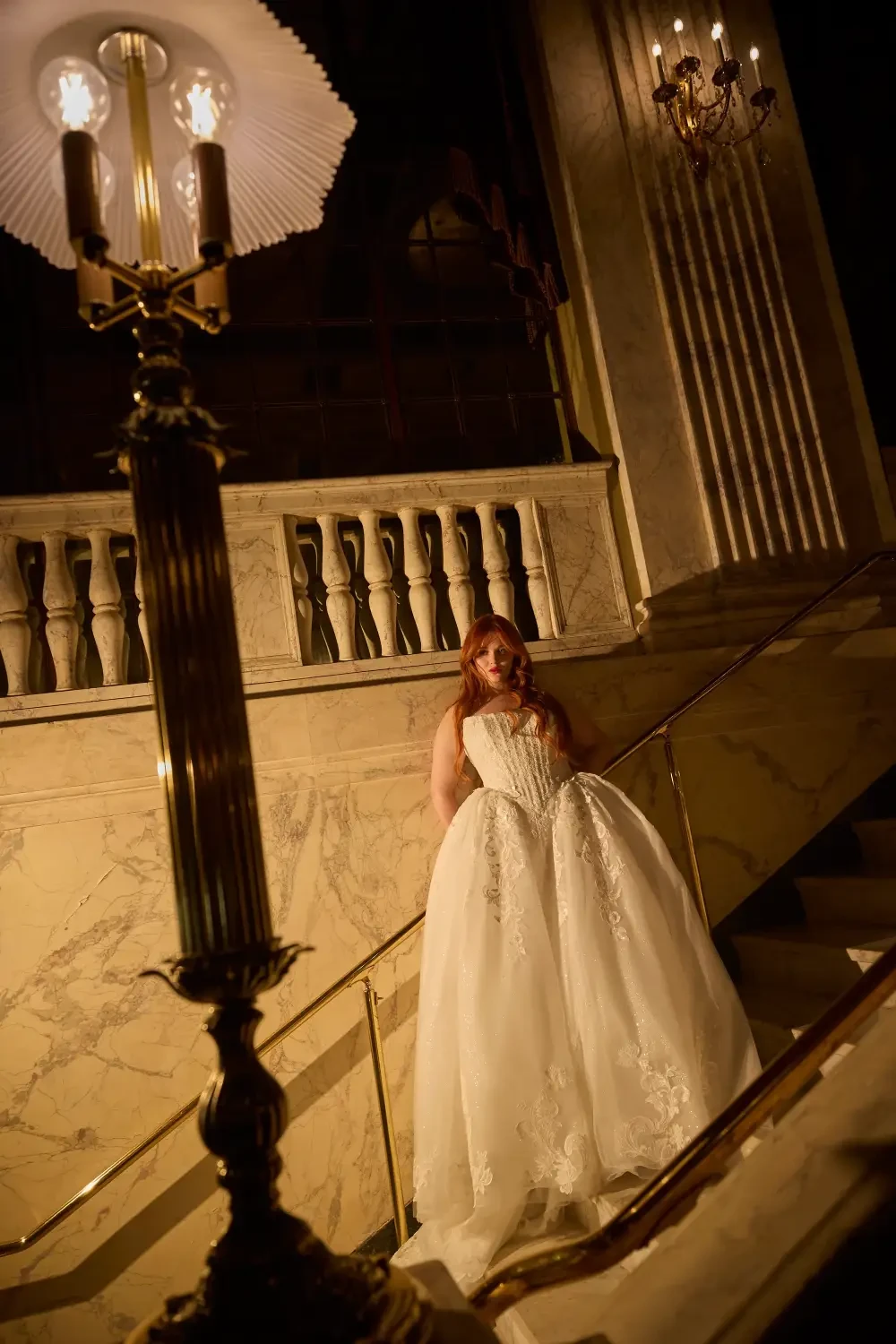 model is wearing a ball gown wedding dress